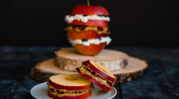 Apple slices with peanut butter and cranberries