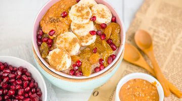 Porridge with peanut butter and pomegranate